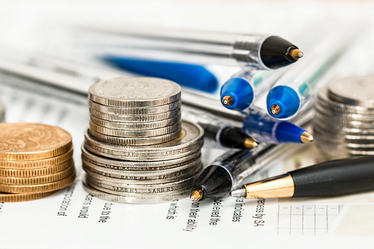 Coins, currency, investment — How Credit Unions Help Members Save More Money?